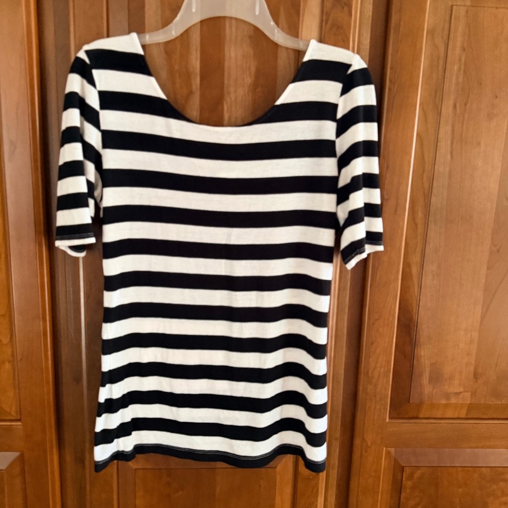 Black and white striped top with bow like detail on back S